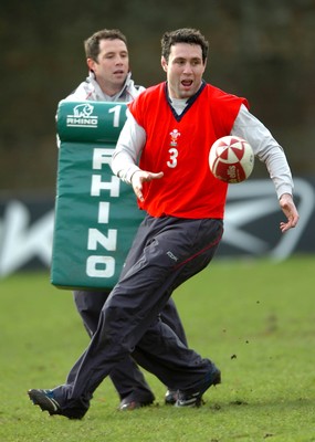 260107 - Wales Rugby Training - Stephen Jones offloads during training 