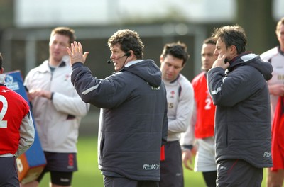 260107 - Wales Rugby Training - Wales Coach, Gareth Jenkins makes a point as Nigel Davies(R) looks on during training 