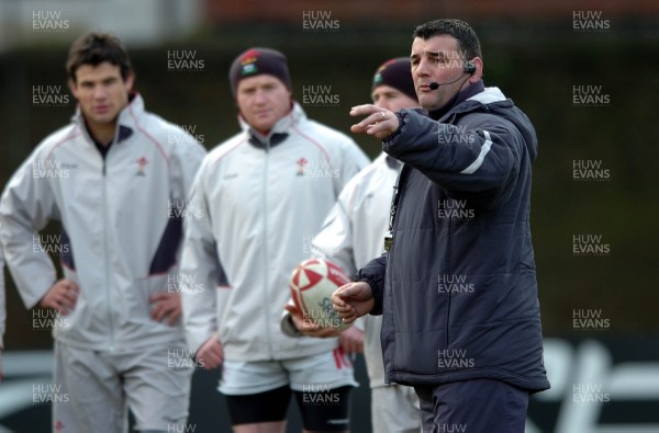 260107 - Wales Rugby Training - Wales defence coach, Rowland Phillips makes a point during training 