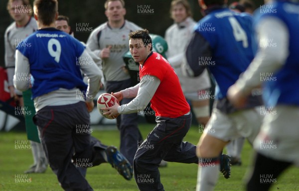 260107 - Wales Rugby Training - Stephen Jones looks for support during training 