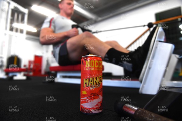 261022 - Wales Rugby Gym Session - Jac Morgan and Nocco drink during a weights session