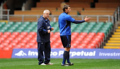 26.11.10 - Wales Rugby Training - Head coach Warren Gatland talks to Tom James during training. 