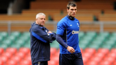 26.11.10 - Wales Rugby Training - Head coach Warren Gatland talks to Tom James during training. 