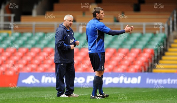 26.11.10 - Wales Rugby Training - Head coach Warren Gatland talks to Tom James during training. 