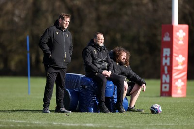 270225 - Wales Rugby Training - T Rhys Thomas, Jonathan Humphreys, Forwards Coach and Adam Jones, Scrum Coach during training