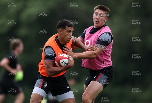 270623 - The Wales Rugby Team training in preparation for the Rugby World Cup - Rio Dyer and Josh Adams during training