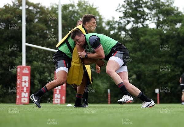 270623 - The Wales Rugby Team training in preparation for the Rugby World Cup - Teddy Williams and Adam Beard during training