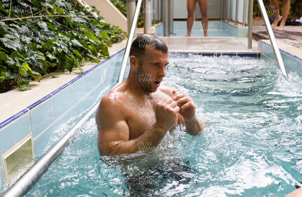 270723 - Wales Rugby Training taking place in Turkey, in preparation for the Rugby World Cup - Gareth Davies in the plunge pool