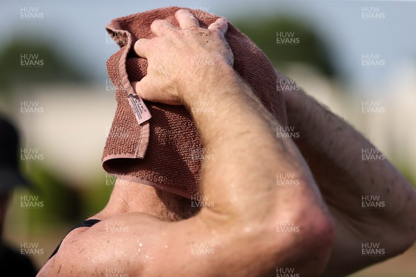 270723 - Wales Rugby Training taking place in Turkey, in preparation for the Rugby World Cup - Gareth Davies cools off during training