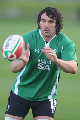 27.10.09 - Wales Rugby Training - Jonathan Thomas in action during training. 
