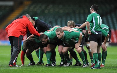 27.11.08 - Wales Rugby Training - Adam Jones, Matthew Rees and Gethin Jenkins pack down during training. 