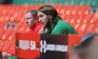 27.11.09 - Wales Rugby Training - Ryan Jones looks on as he sits out of training. 