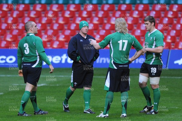 27.11.09 - Wales Rugby Training - (L-R) new captain Gethin Jenkins talks to new back row Martyn Williams, Andy Powell and Dan Lydiate. 