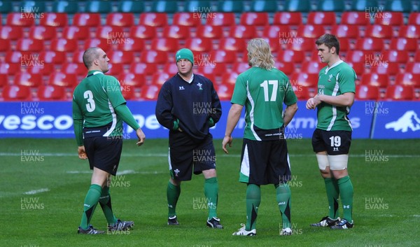 27.11.09 - Wales Rugby Training - (L-R) new captain Gethin Jenkins talks to new back row Martyn Williams, Andy Powell and Dan Lydiate. 