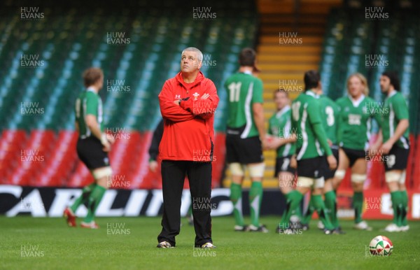 27.11.09 - Wales Rugby Training - Head coach Warren Gtaland looks on during training. 
