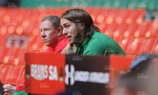 27.11.09 - Wales Rugby Training - Ryan Jones looks on as he sits out of training. 