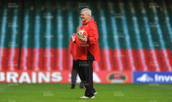 27.11.09 - Wales Rugby Training - Head coach Warren Gtaland looks on during training. 