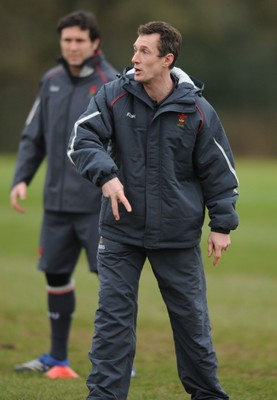 28.01.08 - Wales Rugby Training - Wales Backs Coach, Rob Howley takes players through a move 
