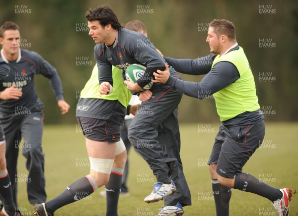 28.02.08 - Wales Rugby Training - Mike Phillips is tackled Rhys Thomas during training 