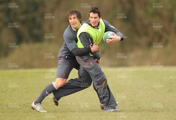 28.02.08 - Wales Rugby Training - James Hook is tackled by Gavin Henson during training 