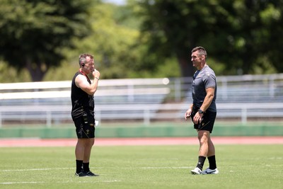 280625 - Wales Rugby Training Session in Kitakyushu - Danny Wilson, Forwards Coach and Huw Bennett, Head of Physical Performance during training