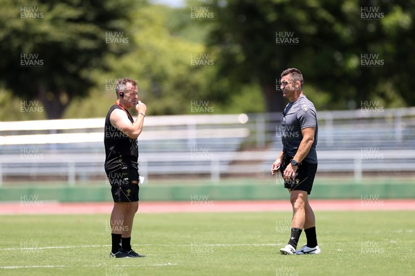 280625 - Wales Rugby Training Session in Kitakyushu - Danny Wilson, Forwards Coach and Huw Bennett, Head of Physical Performance during training