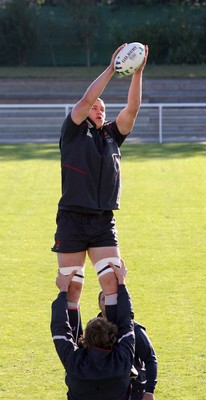 28.09.07 Wales rugby training... Wales Ian Evans secures lineout ball during training in St Nazaire. 
