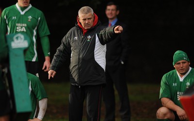 28.10.08 - Wales Rugby Training - Head coach, Warren Gatland makes a point during training as WRU Chief Executive, Roger Lewis looks on. 