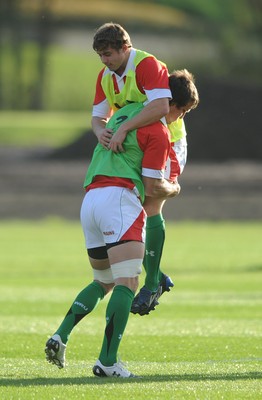 28.10.09 - Wales Rugby Training - Leigh Halfpenny is tackled by Sam Warburton during training. 