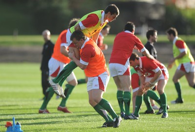 28.10.09 - Wales Rugby Training - Tom James is tackled by Matthew Rees during training. 