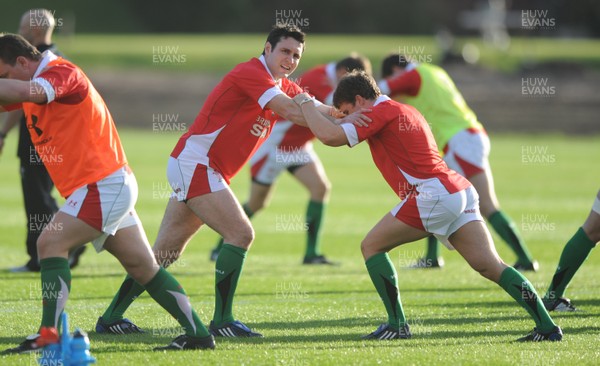 28.10.09 - Wales Rugby Training - Stephen Jones warms up during training. 
