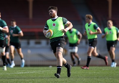 290624 - Wales Rugby Training as they prepare for their Summer Series against Australia - Efan Daniel during training