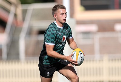 290624 - Wales Rugby Training as they prepare for their Summer Series against Australia - Cameron Winnett during training