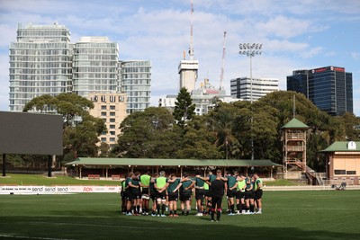 290624 - Wales Rugby Training as they prepare for their Summer Series against Australia - Team huddle