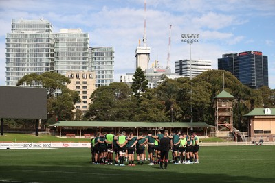 290624 - Wales Rugby Training as they prepare for their Summer Series against Australia - Team huddle