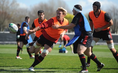 29.09.11 - Wales Rugby Training - Andy Powell is tackled by Ryan Bevington during training. 