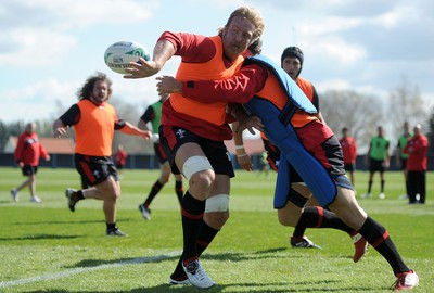 29.09.11 - Wales Rugby Training - Andy Powell is tackled by Ryan Bevington during training. 