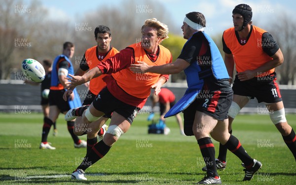 29.09.11 - Wales Rugby Training - Andy Powell is tackled by Ryan Bevington during training. 