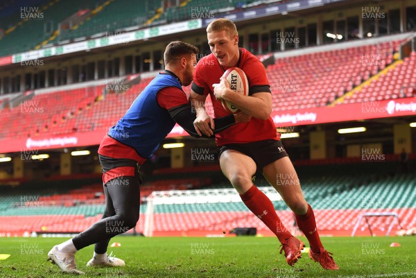 300120 - Wales Rugby Training - Johnny McNicholl and Rhys Webb (left) during training