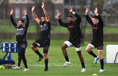 300123 - Wales Rugby Training - Owen Williams, Taulupe Faletau, Christ Tshiunza and Josh Adams during training