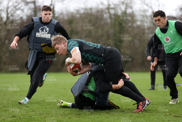300124 - Wales Rugby Training in the week leading up to their 6 Nations game against Scotland - Sam Costelow during training