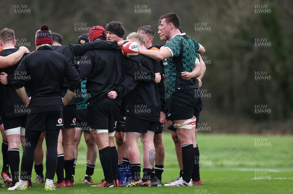 300124 - Wales Rugby Training in the week leading up to their 6 Nations game against Scotland - Adam Beard during training in the team huddle