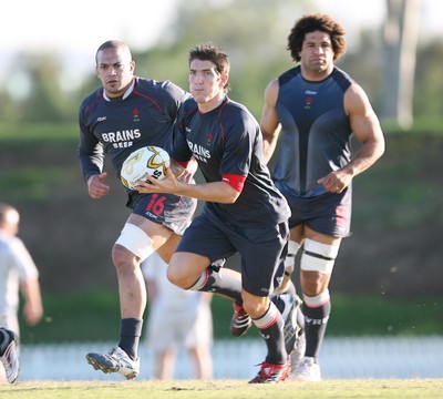 30.05.07  Wales rugby tour to Australia James Hook watched by Gavin Thomas and Colin Charvis in training in Brisbane 