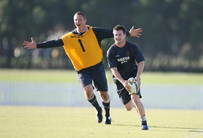 30.05.07  Wales rugby tour to Australia Ceri Sweeney shadowed by Brent Cockbain  in training in Brisbane 