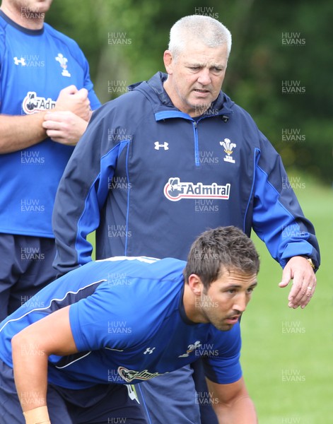 30.05.11 Wales rugby training, Cardiff... GAVIN HENSON ,watched by Coach Warren Gatland,trains with the Wales rugby team in preparation for the game against the Barbarians. 