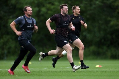 300525 - Wales Rugby Optional Training Session ahead of the start of camp for the summer tour to Japan - Rhodri Williams, James Ratti and Ben Carter during training