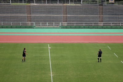 300625 - Wales Rugby Training in Kitakyushu in the week leading up to their first test against Japan - Teddy Williams and Aaron Wainwright during training