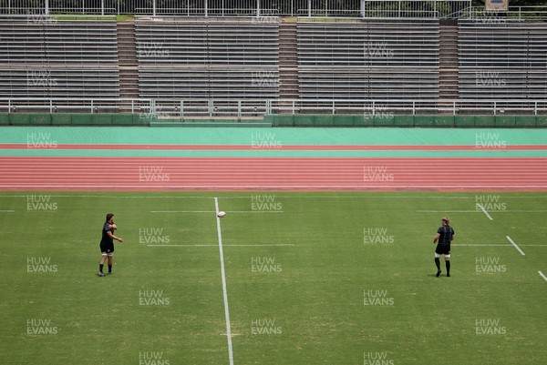 300625 - Wales Rugby Training in Kitakyushu in the week leading up to their first test against Japan - Teddy Williams and Aaron Wainwright during training