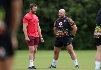 300626 - Wales Rugby Training ahead of the first Nations Championship game against Fiji - Dan Lydiate, Assistant Defence Coach and Dillon Lewis during training