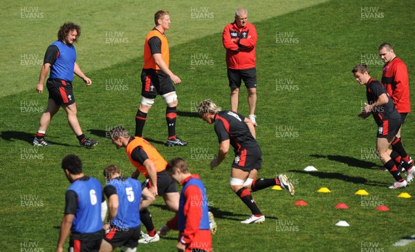 30.09.11 - Wales Rugby Training - Head coach Warren Gatland look on during training. 